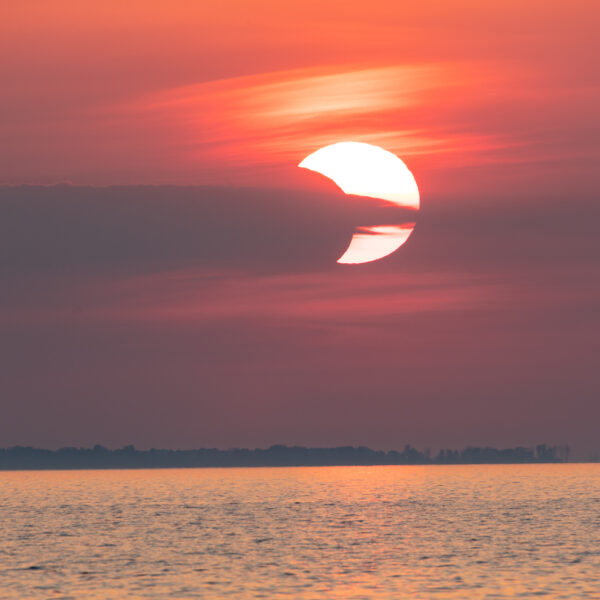 Solar eclipse rising over Green Bay from Oconto Causeway - 10Jun2021 0514CDT - 6x8 -1597